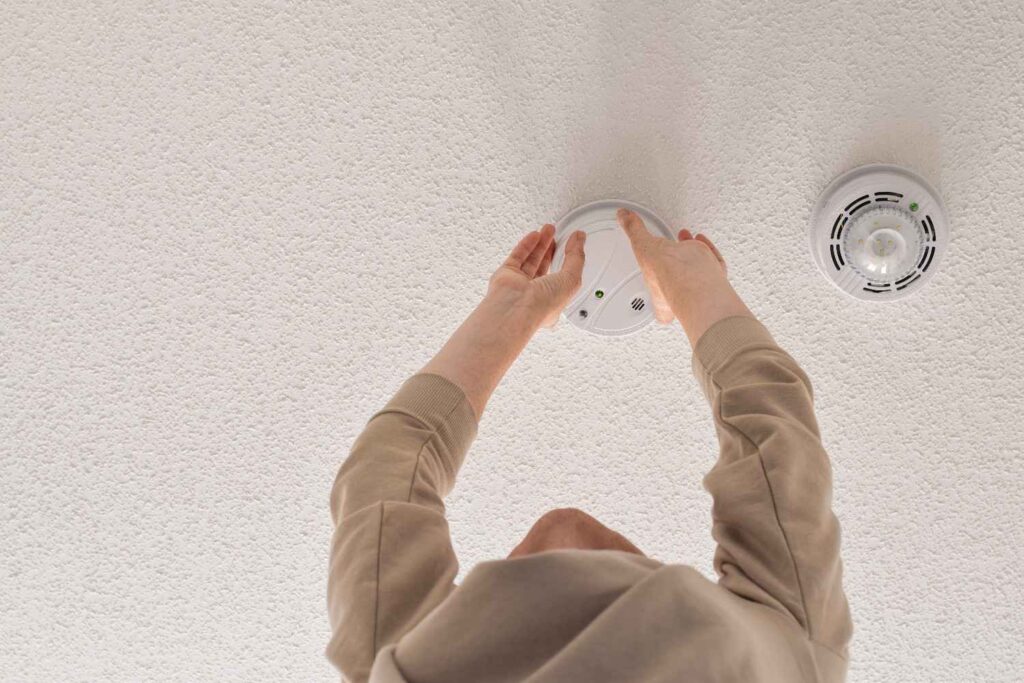 Smoke Detector being checked